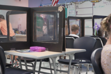 Photo of a classroom with desk shields