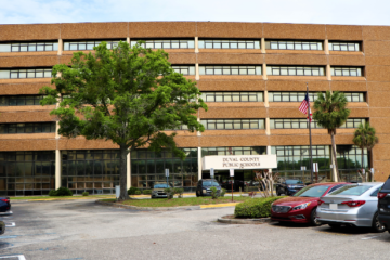 A wide shot of the district building