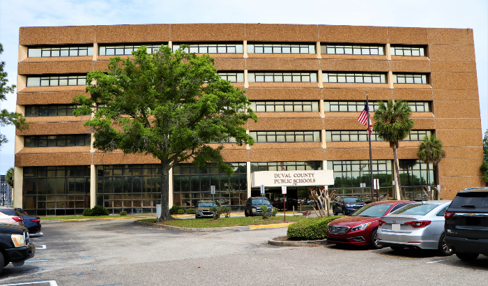 A wide shot of the district building