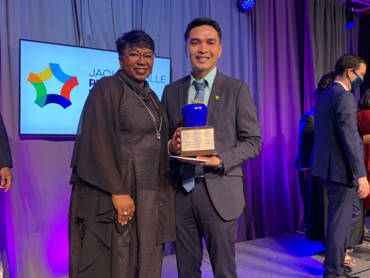 Teacher of the Year Charles Magdaluyo poses with Superintendent Dr. Diana Greene at the EDDY Awards