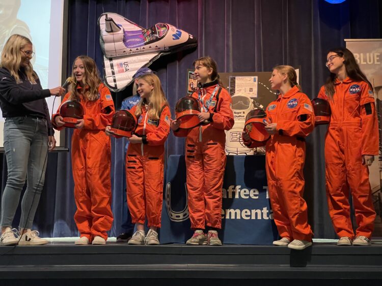 Chaffee Trail students on stage in space suits