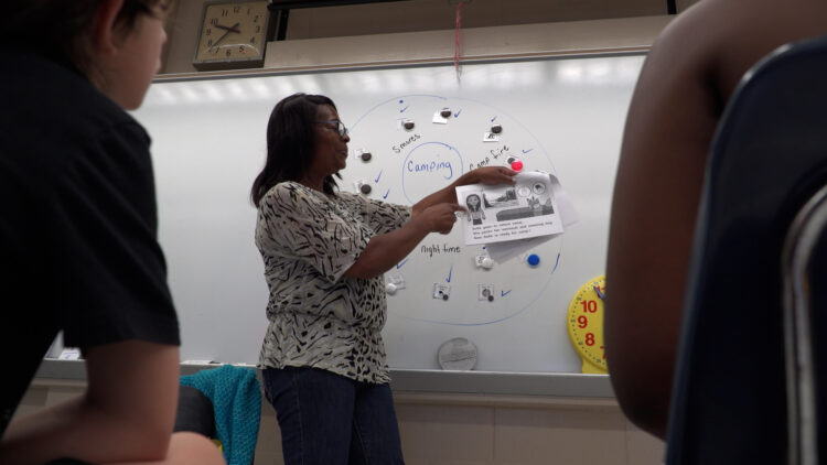 Screenshot of a teacher in the classroom