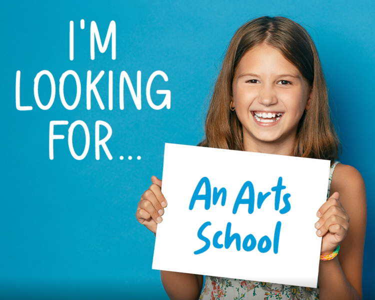 Title reads: I'm Looking For. Child holding sign that reads: An Art School.
