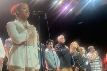 Riverside student recites the pledge at the naturalization ceremony