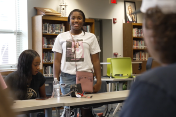Jags student stands up to address peers during meeting