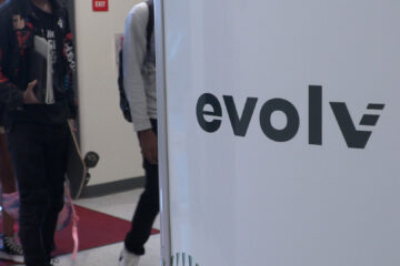 Image of students walking through the Evolve weapons detection system.