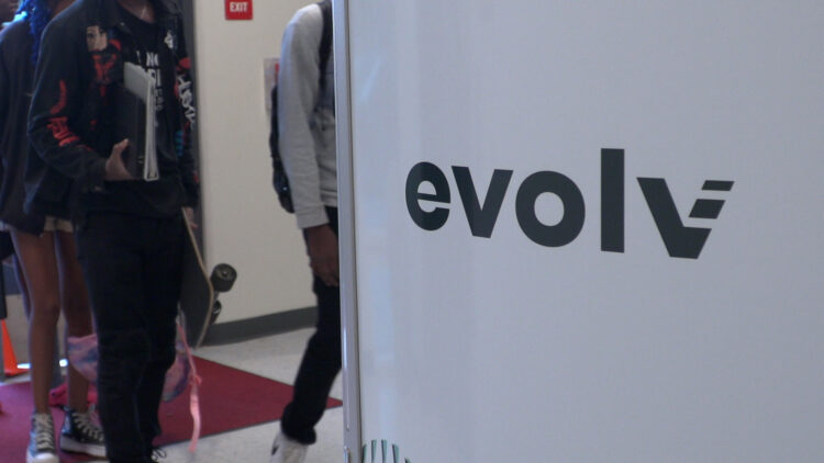 Image of students walking through the Evolve weapons detection system.