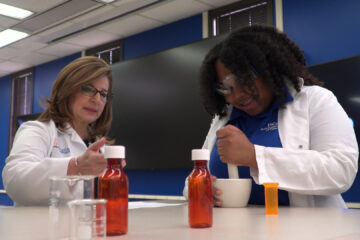 UF Health clinician working with a Paxon student