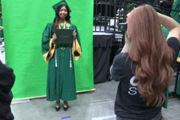 Student in a cap and gown.