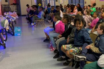 Jacksonville Heights Elementary students react to the news that they are receiving free bikes