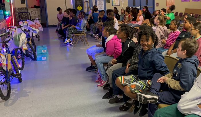 Jacksonville Heights Elementary students react to the news that they are receiving free bikes